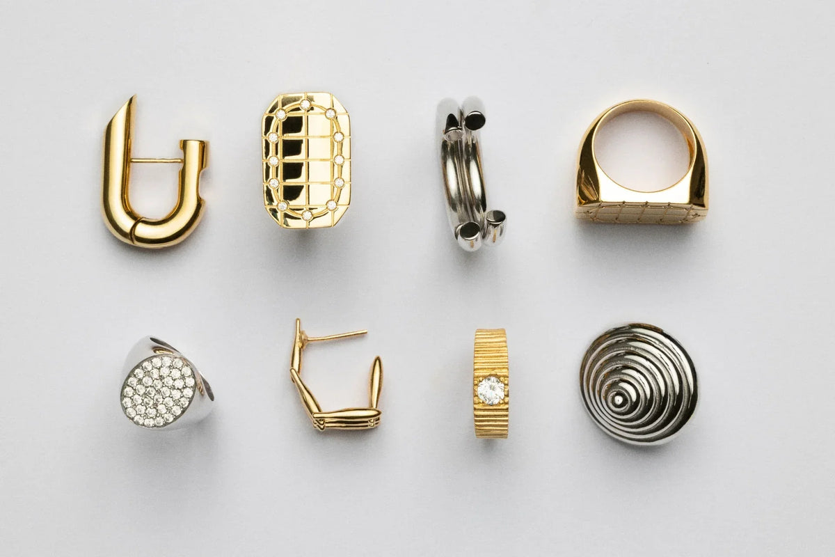 timeless jewelry design CINCO Archive featuring a collection of unique rings in gold and silver finishes.