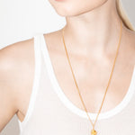 model wearing goldie necklace in gold