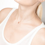 model wearing mock necklace 18k rubi