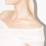 model wearing molly choker in gold